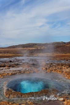 Strokkur on the site of Geysir - Iceland